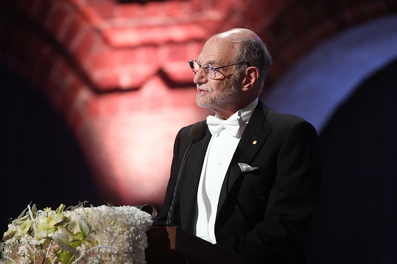 Michael Rosbash, laureate in Medicine 2017 delivers a speech, during the Nobel banquet in the City Hall, in Stockholm, Sunday, Dec. 10, 2017. (Fredrik Sandberg/TT News Agency via AP)