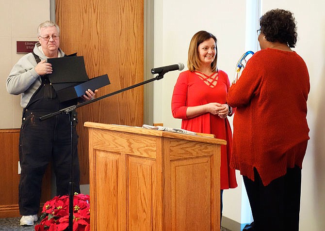 Nancy Hanson, center, was the recipient of the 2017 Jane Bierdeman-Fike Award Friday, awarded annually by the City of Fulton Human Rights Commission and Callaway County. Ten nominees were introduced at the luncheon at Fulton City Hall, and the award was presented by Carmen Brandt and Tom Clapp, both members of the commission.