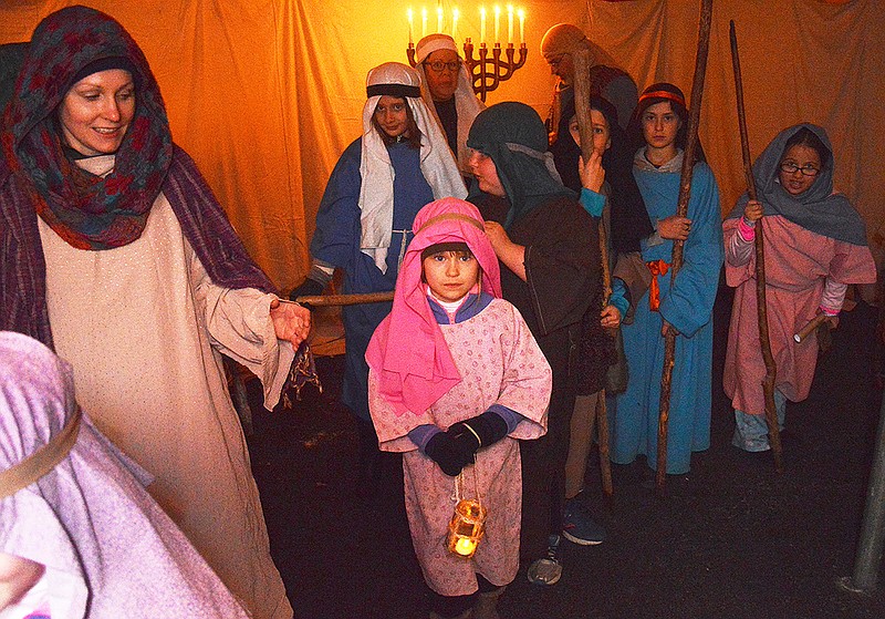 Volunteer actors take visitors back approximately 2,000 years Friday, Dec. 8, 2017, during Journey to Bethlehem at Capital City Christian Church. The outdoor Christmas program travels through time to the birth of Jesus. 