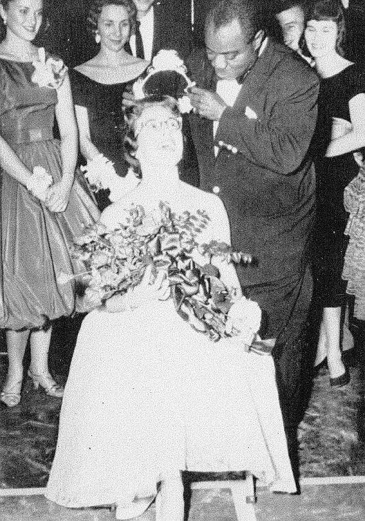 <p>Submitted</p><p>Jazz musician Louis Armstrong crowns Westminster’s All School Dance Queen Milly Kay Neukomm, a local Fulton girl, at a concert at the college in 1958.</p>