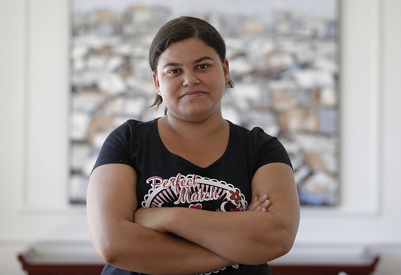 Rebeca Mendes poses for a photo during an interview in Sao Paulo, Brazil, Monday, Dec. 11, 2017. Mendes filed a case with the Supreme Court in late November seeking to have an abortion when she was six weeks pregnant, but the court rejected her request so while waiting for a decision on another petition she traveled to Colombia and had an abortion there. (AP Photo/Andre Penner)