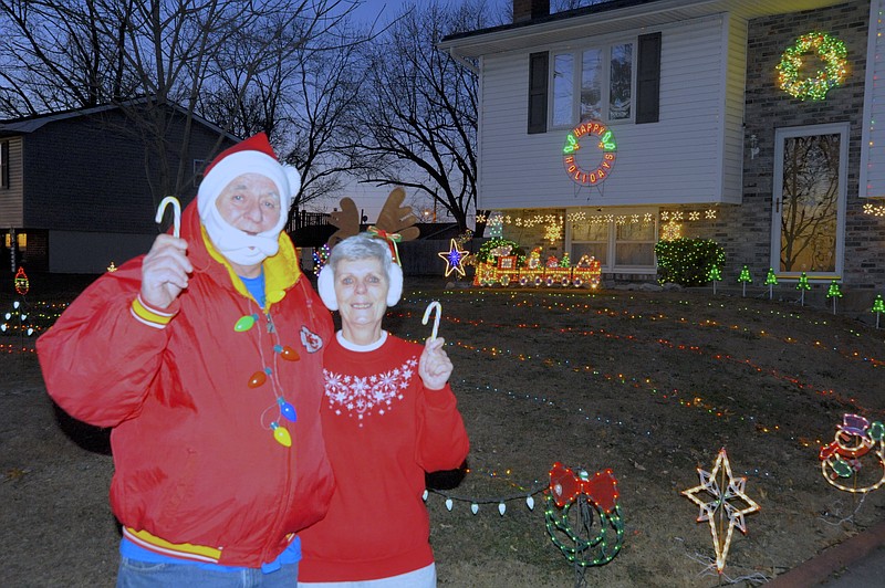 Ron and Gloria Albin invite the community to come by their home at 404 W. Meadow Lane to view their light display and receive a candy cane.