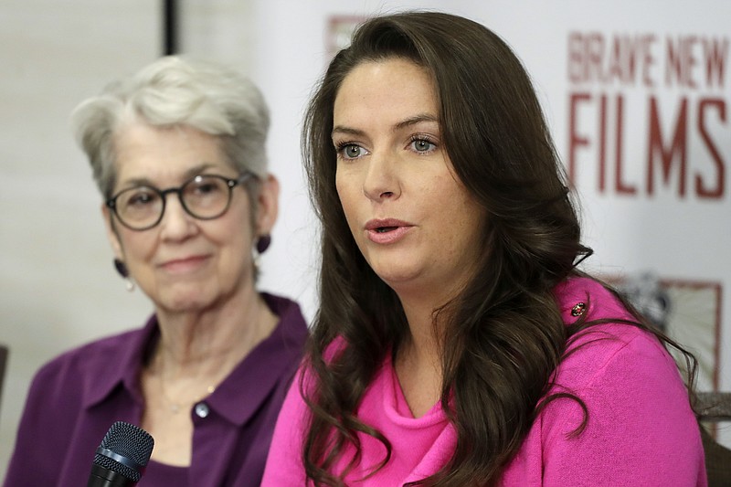 Jessica Leeds, left, and Samantha Holvey attend a news conference, Monday, Dec. 11, 2017, in New York to discuss their accusations of sexual misconduct against Donald Trump. The women, who first shared their stories before the November 2016 election, were holding the news conference to call for a congressional investigation into Trump's alleged behavior.  (AP Photo/Mark Lennihan)