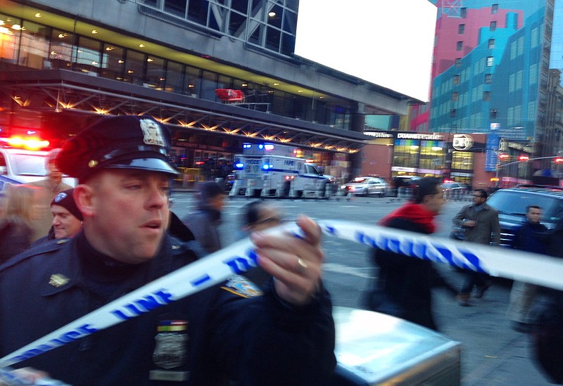 Police respond to a report of an explosion near Times Square on Monday, Dec. 11, 2017, in New York. 