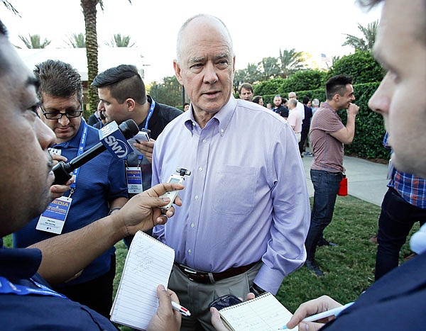 Sandy Alderson, general manager of the New York Mets, talks with reporters at the annual general managers' meetings last month in Orlando, Fla.