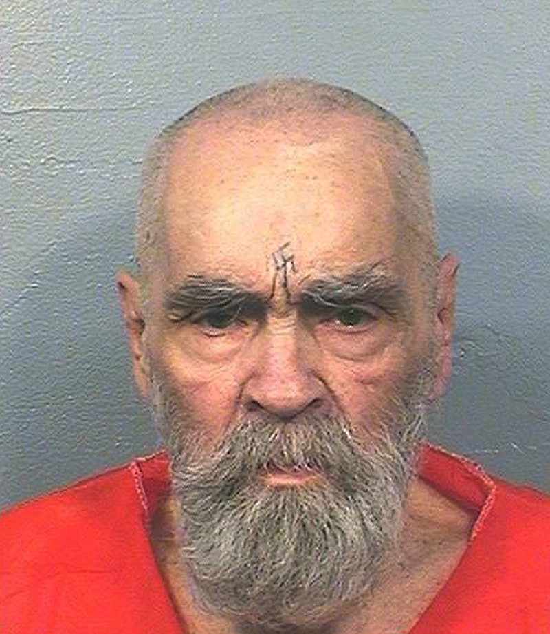 FILE - This Aug. 14, 2017 file photo provided by the California Department of Corrections and Rehabilitation shows Charles Manson. Manson died of cardiac arrest accompanied by respiratory failure, triggered by colon cancer that had spread to other areas of his body. The deadly cult leader's death certificate confirms that he died Nov. 19, 2017, at Bakersfield's Mercy Hospital, near where the 83-year-old had been serving a life sentence for orchestrating the 1969 killings of pregnant actress Sharon Tate and eight other people. (California Department of Corrections and Rehabilitation via AP, File)