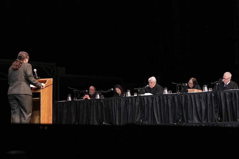 Attorney Rebecca Copeland, left, who is representing a divorced lesbian woman who wants to dissolve parental rights, argues in front of the Hawaii Supreme Court, Thursday, Dec. 14, 2017 in Kaneohe, Hawaii. National gay rights advocates are watching how the case plays out in Hawaii, likely the first such case before a state's highest court, experts say. A woman wants to sever her parental rights to a child her ex-wife gave birth to and is appealing a family court ruling denying that request. (AP Photo/Jennifer Sinco Kelleher)