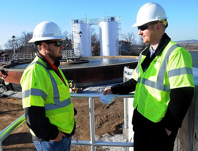 FILE: Curtis Wheat, left, and Brian Russell, right, give a tour on Wednesday, Dec. 14, 2017, of the Missouri American Water treatment plant and the series of upgrades underway at the Jefferson City facility.