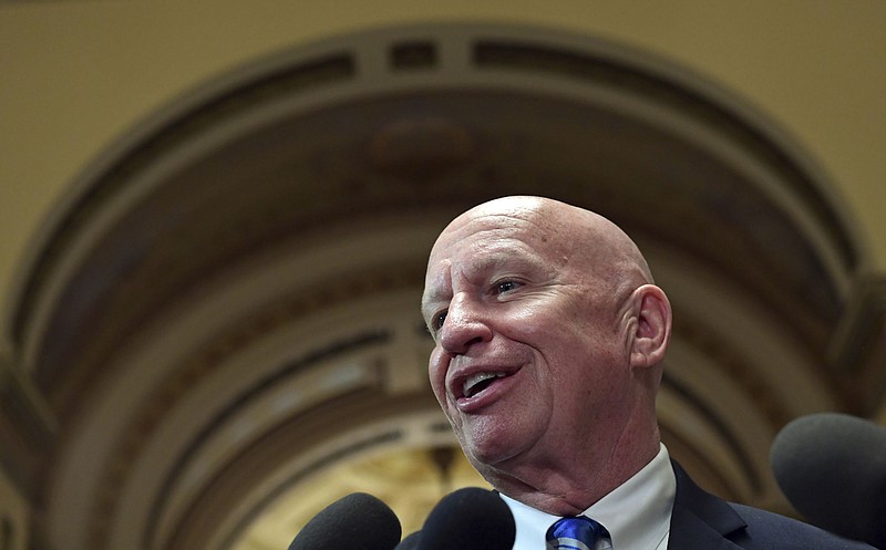 House Ways and Means Committee Chairman Rep. Kevin Brady, R-Texas., speaks to reporters on Capitol Hill in Washington, Friday, Dec. 15, 2017, on the progress of an agreement on a sweeping overhaul of the nation's tax laws.