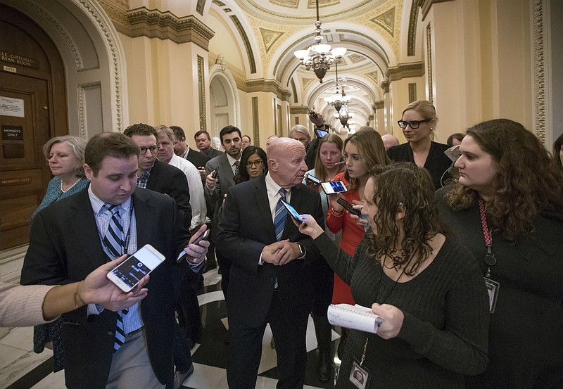 House Ways and Means Committee Chairman Kevin Brady, R-Texas, talks to reporters at the Capitol after Republicans signed the conference committee report to advance the GOP tax bill, in Washington, Friday, Dec. 15, 2017. (AP Photo/J. Scott Applewhite)