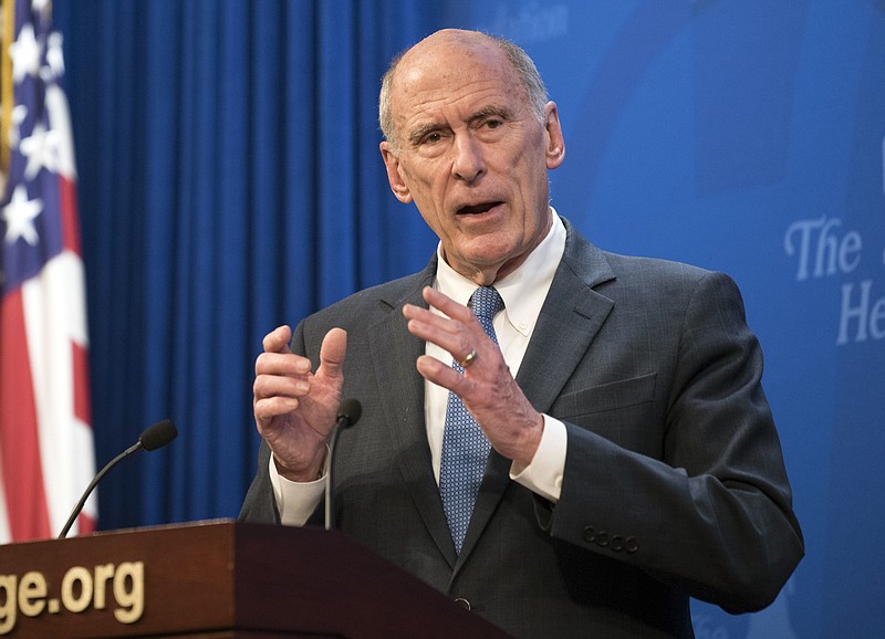 FILE - In this Oct. 13, 2017, file photo, Director of National Intelligence Dan Coats speaks at a Heritage Foundation event in Washington. A decision to put the man who handles whistleblower complaints at U.S. spy agencies on administrative leave has prompted an investigation Sen. Chuck Grassley, R-Iowa, who worries that it’s part of a plan to hamstring the program that helps intelligence workers report waste, fraud and abuse. Whistleblower groups were alarmed when they heard that Dan Meyer, director of the Intelligence Community Whistleblowing and Source Protection program, was put on leave late last month and escorted out of his offices. In a letter to Coats, Grassley, referred to allegations that intelligence officials are taking steps to hamper the four-year-old program. (AP Photo/Kevin Wolf, File)