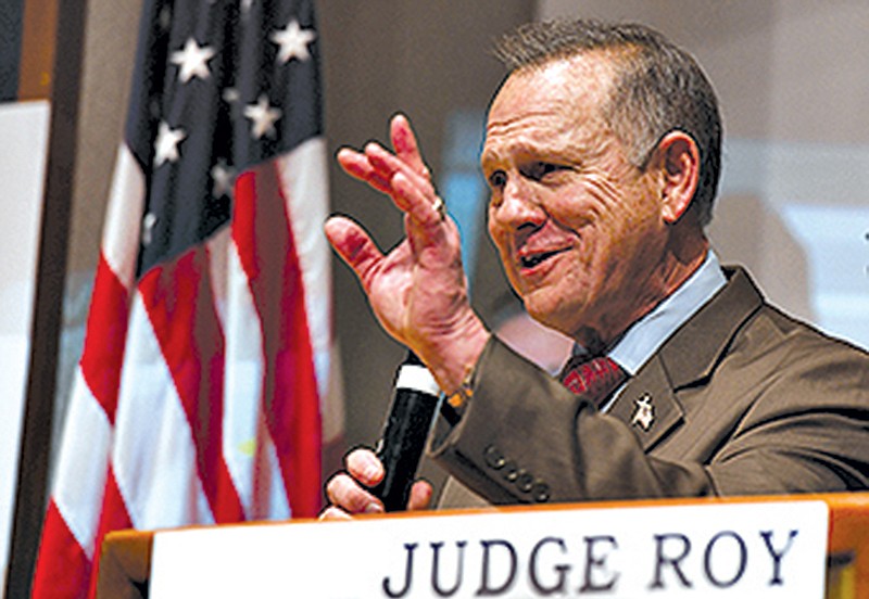 Republican candidate for US Senate Roy Moore addresses supporters after a historic loss to Democrat Doug Jones on Dec. 12, 2017 in Montgomery, Ala.