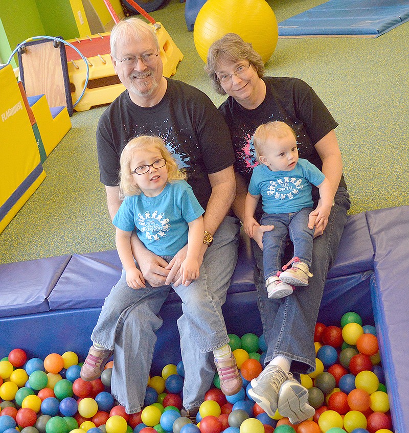 Michael and Kelly Brenner with their grandchildren at the Special Learning Center.