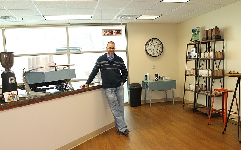Three Story Coffee owner Tony Anderson poses in Three Story Coffee's new location inside Jefferson City Medical Group.