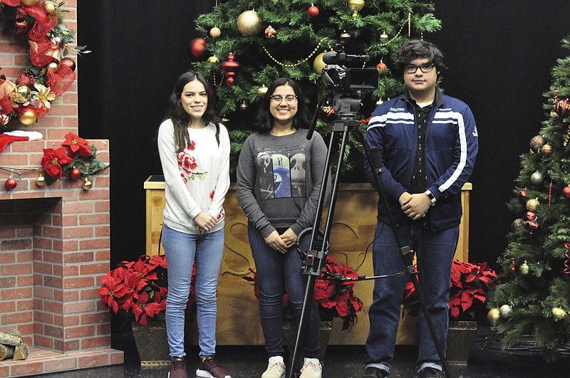 San Benito High School students gain television production experience as interns by participating through the San Benito Consolidated Independent School District's Career and Technical Education program. Alicia Medina, April Guerrero and David De La Rosa are are involved in all aspects of production of the school district's public access station and daily programming.