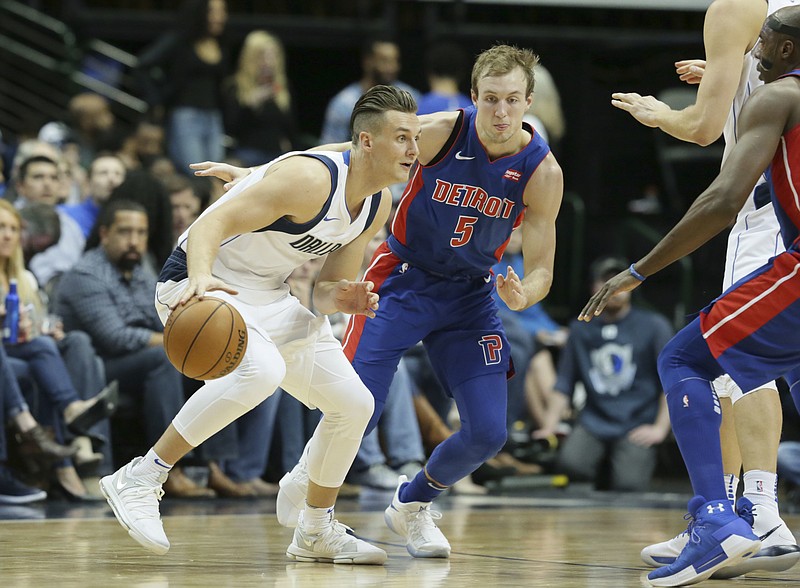 Dallas Mavericks guard Kyle Collinsworth dribbles against Detroit Pistons guard Luke Kennard (5) during the first half of an NBA basketball game in Dallas, Wednesday, Dec. 20, 2017. 