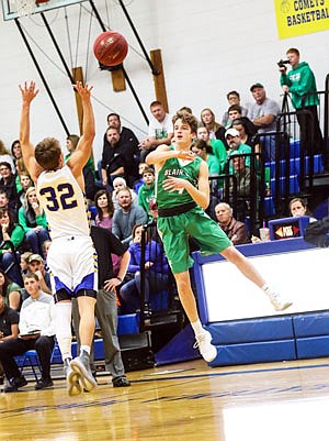 Webb Villmer of Blair Oaks makes a pass in front of Jacob Crede of Fatima during Friday night's game in Westphalia.