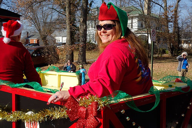 Tamara Tateosian, executive director of the Callaway Chamber of Commerce, participates in the Fulton Christmas Parade.