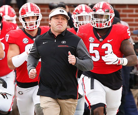 Georgia coach Kirby Smart will lead his team into Monday night's College Football Playoff title game against Alabama in Atlanta.