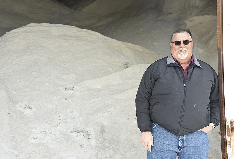 Julie Smith/News Tribune
Road superintendent Larry Bishop poses inside the salt storage unit at Cole County Public Works on Monticello Road Thursday. Over the course of his career, he has probably scattered the equivelant of what is currently stored behind him.