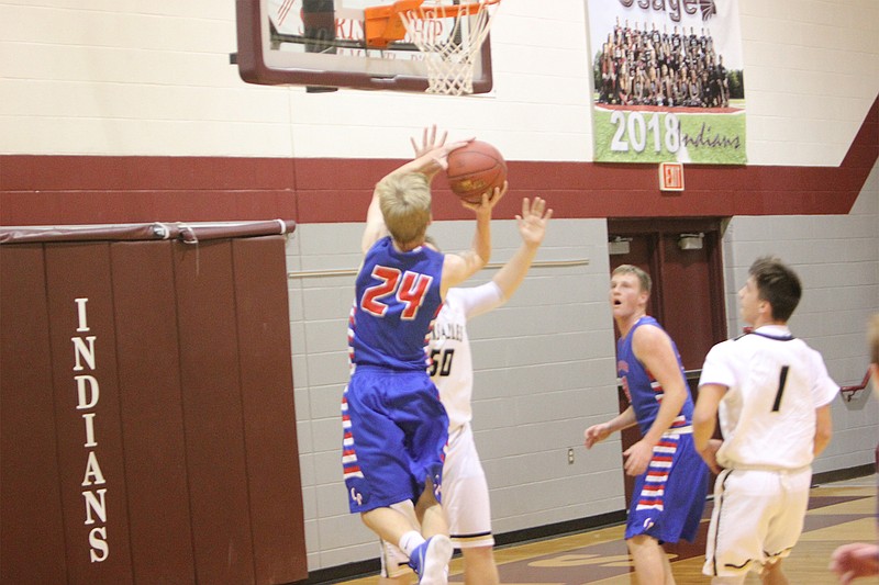 <p>Democrat photo/ Kevin Labotka</p><p>California fell to Versailles 98-92 in the consolation championship game Jan. 4 of the Tri-County Conference Tournament at Osage.</p>