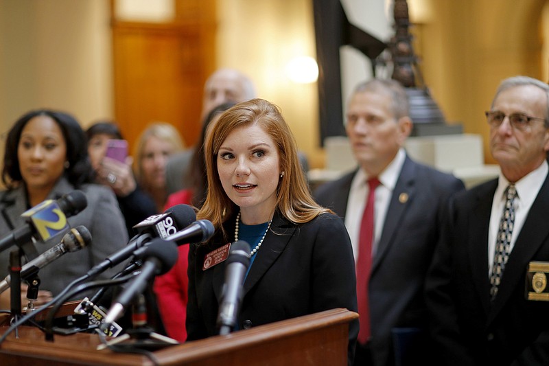 Rep. Meagan Hanson, R - Brookhaven, speaks at a press conference at the state Capitol on a hate crime bill she is sponsoring in Atlanta, Wednesday, Jan. 3, 2018. Hanson is proposing the hate crime law, saying it's time for Georgia to join 45 other states in imposing harsher penalties on people convicted of crimes motivated by hate. The state previously passed a hate crime law in 2000 but the state Supreme Court struck it down, saying it was too vague. (AP Photo/David Goldman)