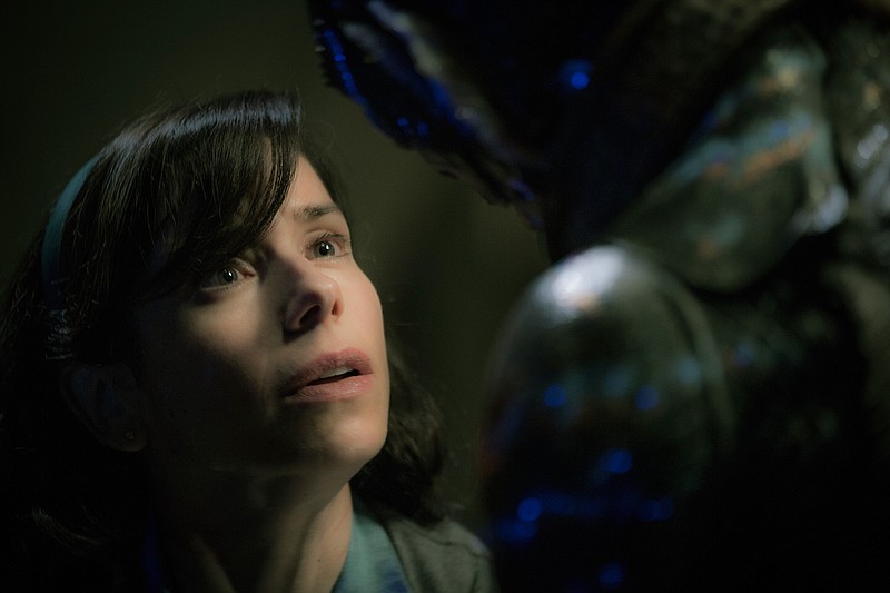 This image released by Fox Searchlight Pictures shows Sally Hawkins, left, and Doug Jones in a scene from the film "The Shape of Water." The American Film Institute is hosting a luncheon Friday, Jan. 5, 2018, to celebrate its selections of the past year's best top films and TV shows, many of which are also in contention for the Golden Globe Awards, including "The Shape of Water," "Call Me By Your Name," "Dunkirk," "Get Out," "Lady Bird," "The Post," and others, on Sunday. 