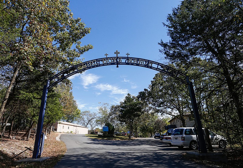 This Oct. 17, 2017 photo, shows the entrance to the Lives Under Construction Boys Ranch in Lampe, Mo. A lawsuit filed on behalf of three former residents of the southwest Missouri ranch for troubled boys accuses the Christian residential facility of covering up allegations of rapes and sexual assaults.