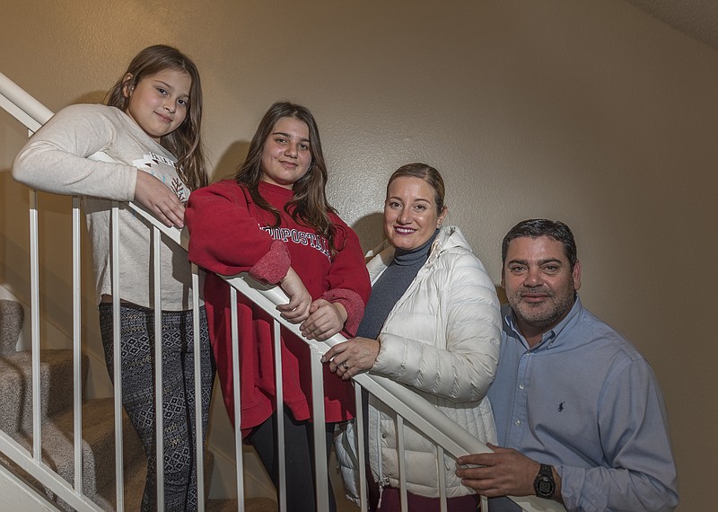Angel Perez, far right, his wife Lina Dib, daughters Alina, far left, and Camila moved from Puerto Rico to Richardson after the hurricane. (Rex C. Curry/Dallas Morning News/TNS) 