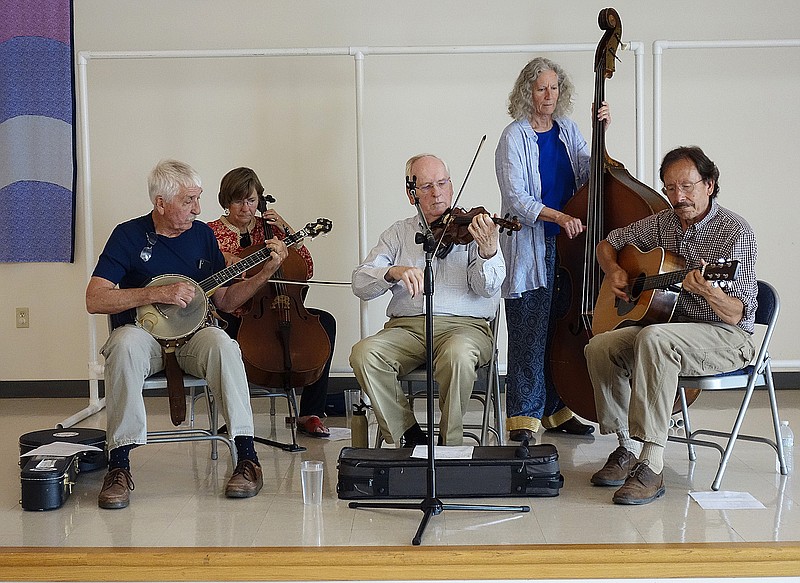 <p>Jenny Gray/For the News Tribune</p><p>Howard Marshall and company performed last June in Fulton. The group included, from left, Bill Foley, of Ashland, on banjo; Margot McMillen, of North Callaway County, on cello; Marshall and Kathy Gordon, of Columbia, on upright bass; and Henrich Leonhard, of Columbia, on guitar.</p>