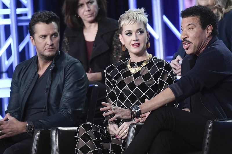 Luke Bryan, from left, Katy Perry and Lionel Richie participate in the "American Idol" panel during the Disney/ABC Television Critics Association Winter Press Tour on Monday, Jan. 8, 2018, in Pasadena, Calif. (Photo by Richard Shotwell/Invision/AP)