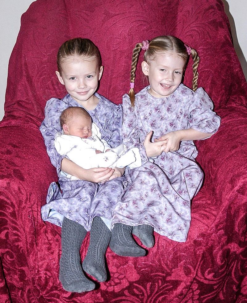Tiana Lenae Kilmer, 2018 Moniteau County first baby, with sisters Nyla, 4, left, and Julie, 5.