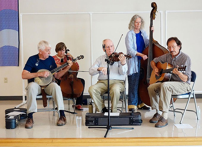 Howard Marshall and company performed last June in Fulton. The group included, from left, Bill Foley, of Ashland, on banjo; Margot McMillen, of northern Callaway County, on cello; Marshall and Kathy Gordon, of Columbia, on upright bass; and Henrich Leonhard, of Columbia, on guitar.