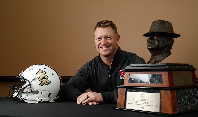 Nebraska football coach Scott Frost, formerly with Central Florida, poses with the Paul "Bear" Bryant award ahead of the 32nd annual Paul "Bear" Bryant Awards, Wednesday, Jan. 10, 2018, in Houston. 