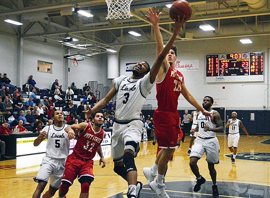 Maurice Mason of Lincoln goes up for a shot during Thursday night's game against Pittsburg State at Jason Gym.