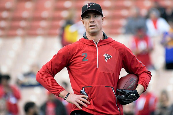 Falcons quarterback Matt Ryan watches during warm ups before last Saturday's wild-card playoff game against the Rams in Los Angeles.