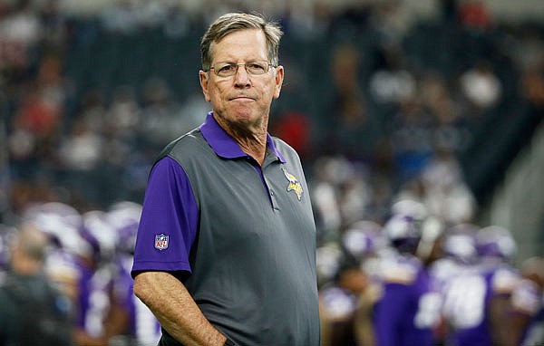 In this Aug. 29, 2015, file photo, Vikings offensive coordinator Norv Turner watches the team warm up before a preseason game against the Cowboys in Arlington, Texas.