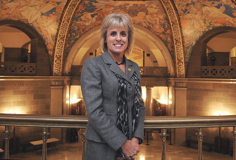 Mark Wilson/News Tribune
Kelli Jones poses in the rotunda of the Missouri State Capitol Thursday. She is the new communications manager for Lt. Gov. Mike Parson. 
