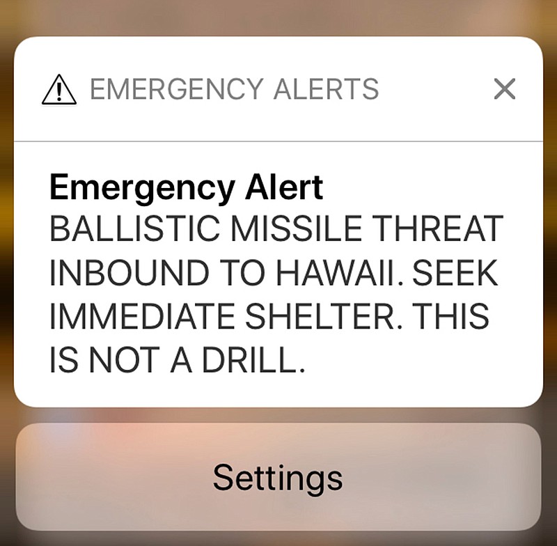 This smartphone screen capture shows a false incoming ballistic missile emergency alert sent from the Hawaii Emergency Management Agency system on Saturday, Jan. 13, 2018.
