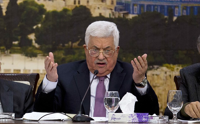 Palestinian President Mahmoud Abbas, speaks during a meeting with the Palestinian Central Council, a top decision-making body, at his headquarters in the West Bank city of Ramallah, Sunday, Jan. 14, 2018. (AP Photo/Majdi Mohammed,l)
