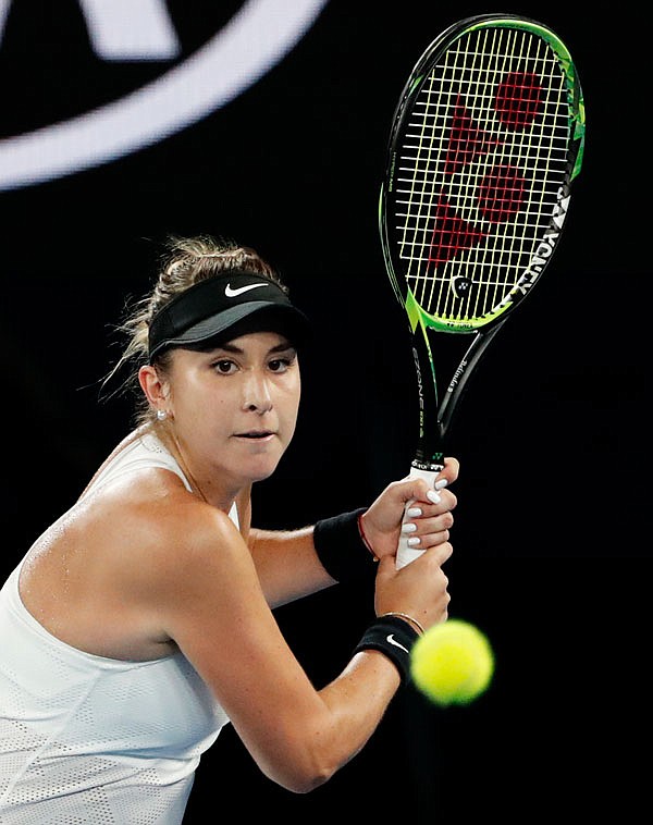 Belinda Bencic eyes on the ball for a return to Venus Williams during their first round match today at the Australian Open in Melbourne, Australia.