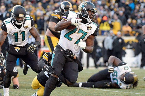 Jaguars running back Leonard Fournette runs the ball against the Steelers during the second half of Sunday's AFC divisional playoff game in Pittsburgh.