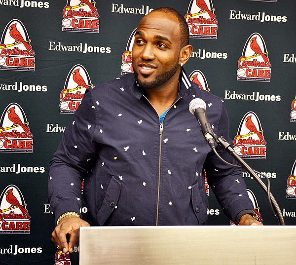 Cardinals outfielder Marcell Ozuna answers a question during Sunday's news conference at the team's annual "Winter Warm-Up" in St. Louis. Ozuna was traded to the Cardinals from the Marlins last month, and the All-Star outfielder is expected to have an immediate impact in the St. Louis lineup.
