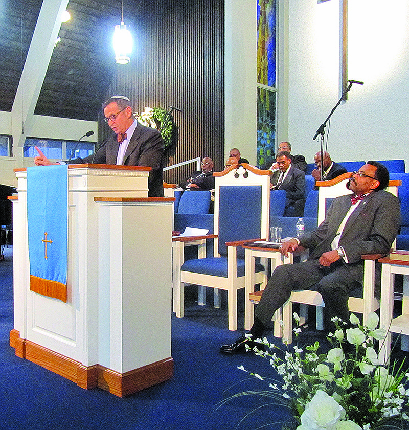 Rabbi Doug Alpert gives the featured speech during Sunday's annual Martin Luther King Jr. remembrance ceremony at Second Baptist Church.