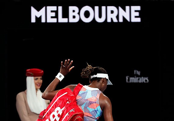 Venus Williams leaves Rod Laver Arena following her first-round loss Monday to Belinda Bencic at the Australian Open in Melbourne, Australia.
