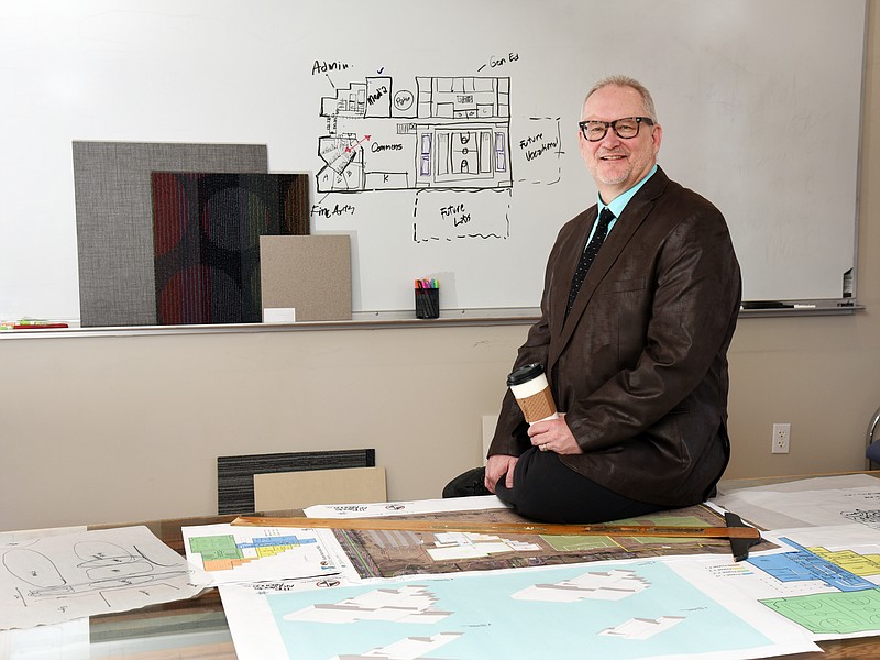 Julie Smith/News Tribune
Architect Cary Gampher poses in his W. Main Street office. 