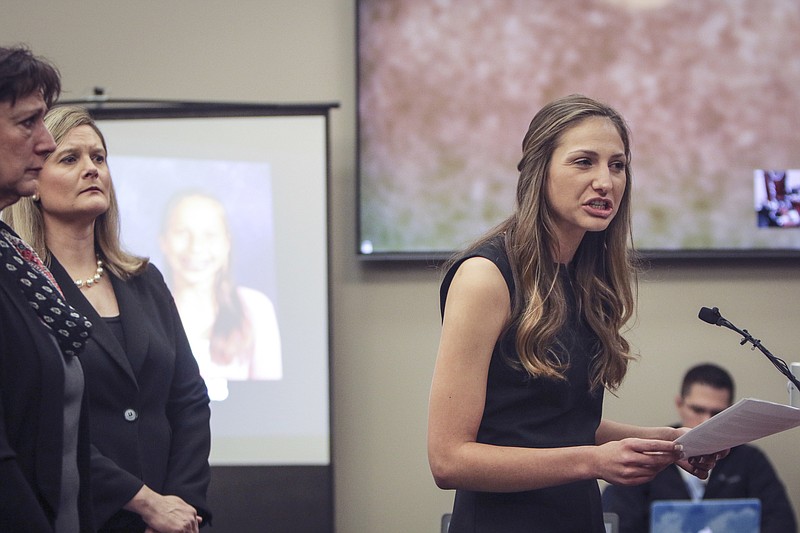 <p>AP</p><p>Former family friend and babysitter to the Nassar family Kyle Stephens, right, addresses Larry Nassar during the first day of the victim impact statements addressing the former sports medicine doctor in Lansing, Michigan. Behind Stephens is her mother, and Assistant Prosecutor Angela Povilaitis, center.</p>