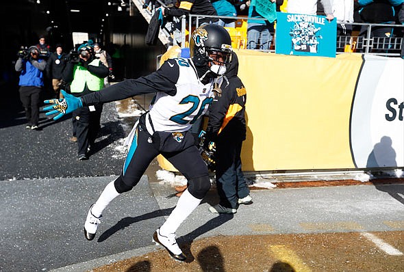 Jaguars cornerback Jalen Ramsey sprints onto the field for warm ups before Sunday's game against the Steelers in Pittsburgh.