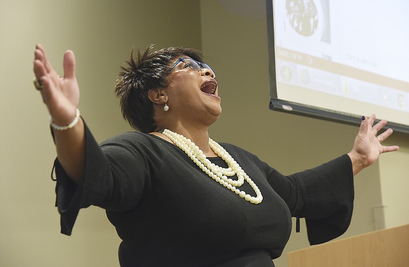 Sylvia Ferguson delivers an inspirational performance Monday as she sings "His Eye is on the Sparrow" near the conclusion of St. Mary's Hospital's "Unity in Diversity," a celebration of the life and works of Dr. Martin Luther King Jr.