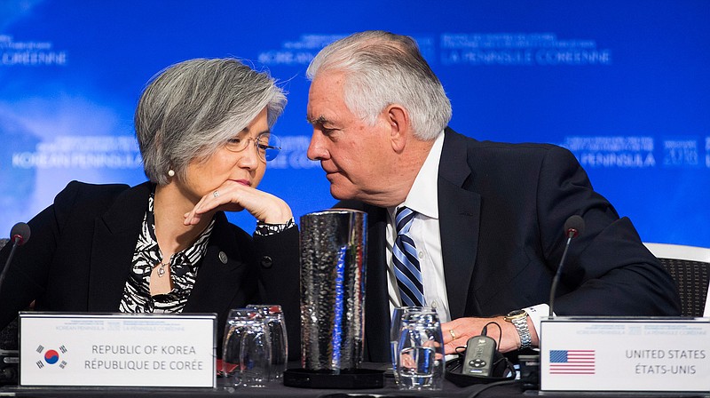 United States Secretary of State Rex Tillerson speaks with South Korean Foreign Minister Kang Kyung-wha during a meeting on North Korea in Vancouver, British Columbia, Tuesday, Jan. 16, 2018. Officials are discussing sanctions, preventing the spread of weapons and diplomatic options.